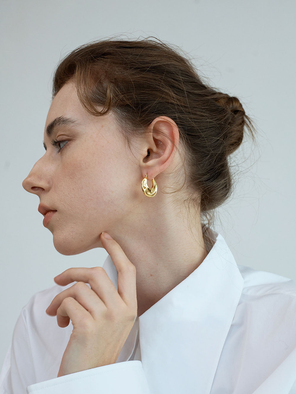 Gold Pinched Sculptural Huggie Hoops