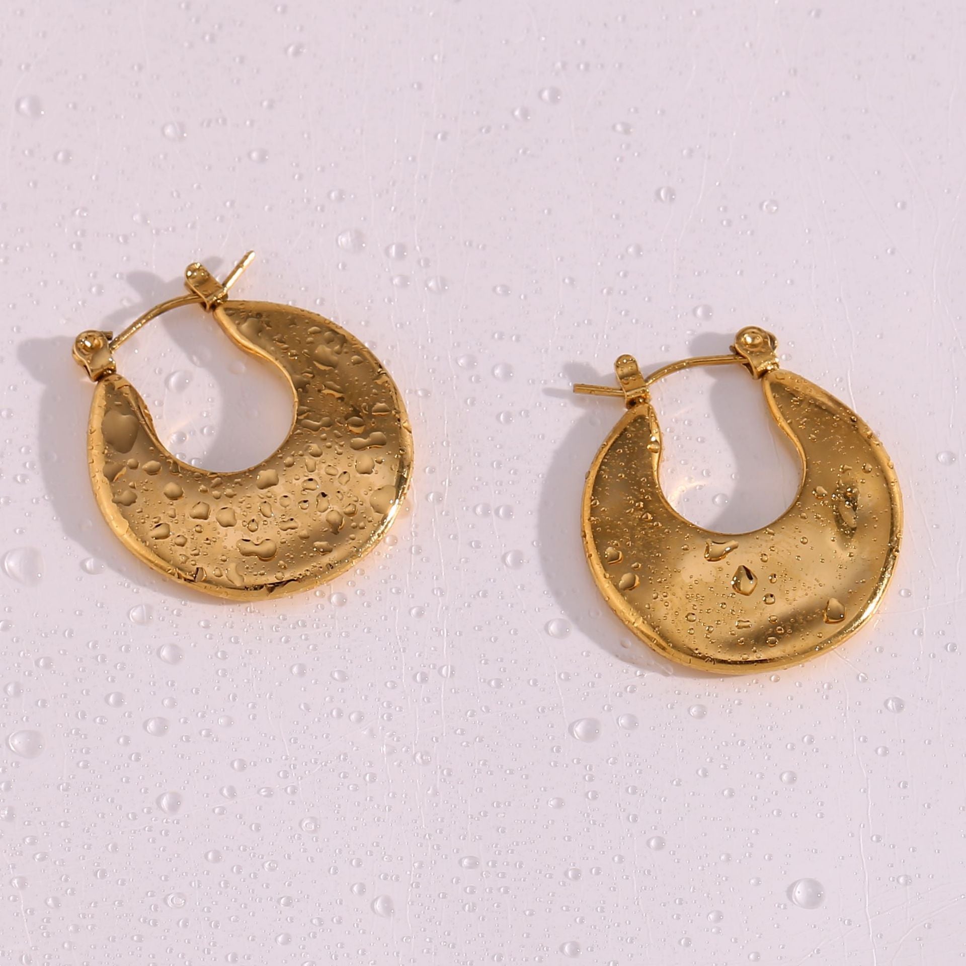 Gold Pinched Sculptural Huggie Hoops