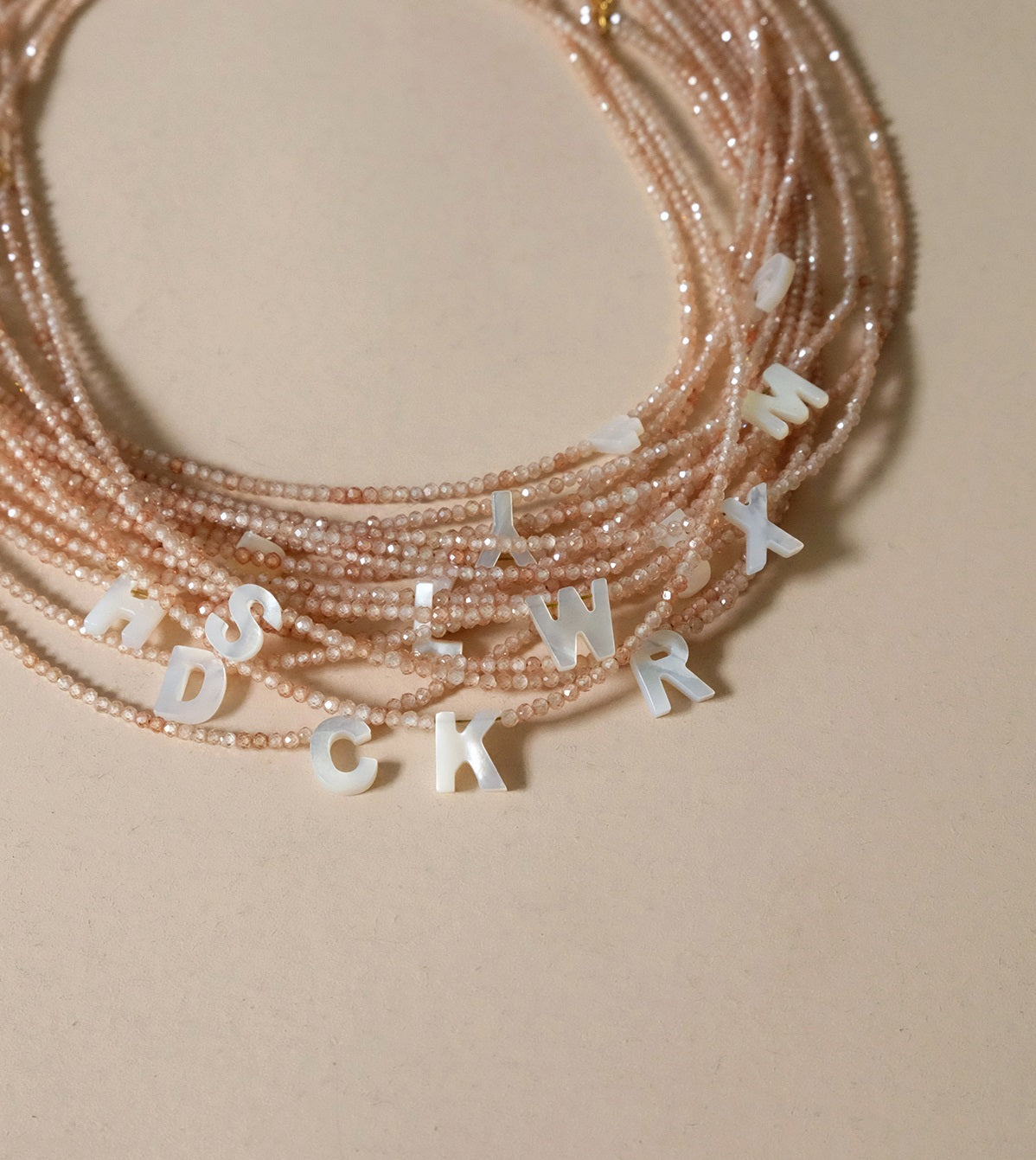 Earth Tone Shimmering Letter Choker