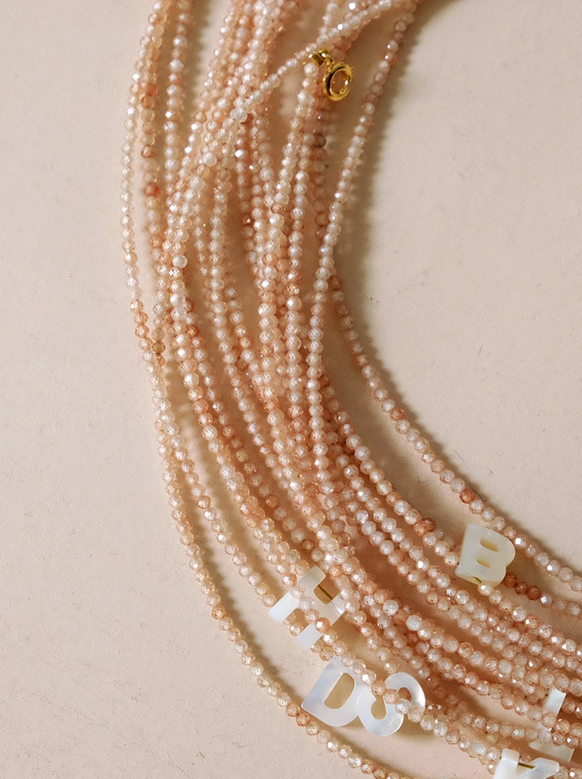 Earth Tone Shimmering Letter Choker